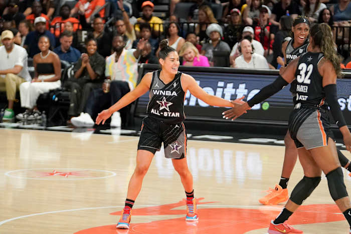 Kelsey Plum celebrates during the 2023 WNBA All-Star Game.